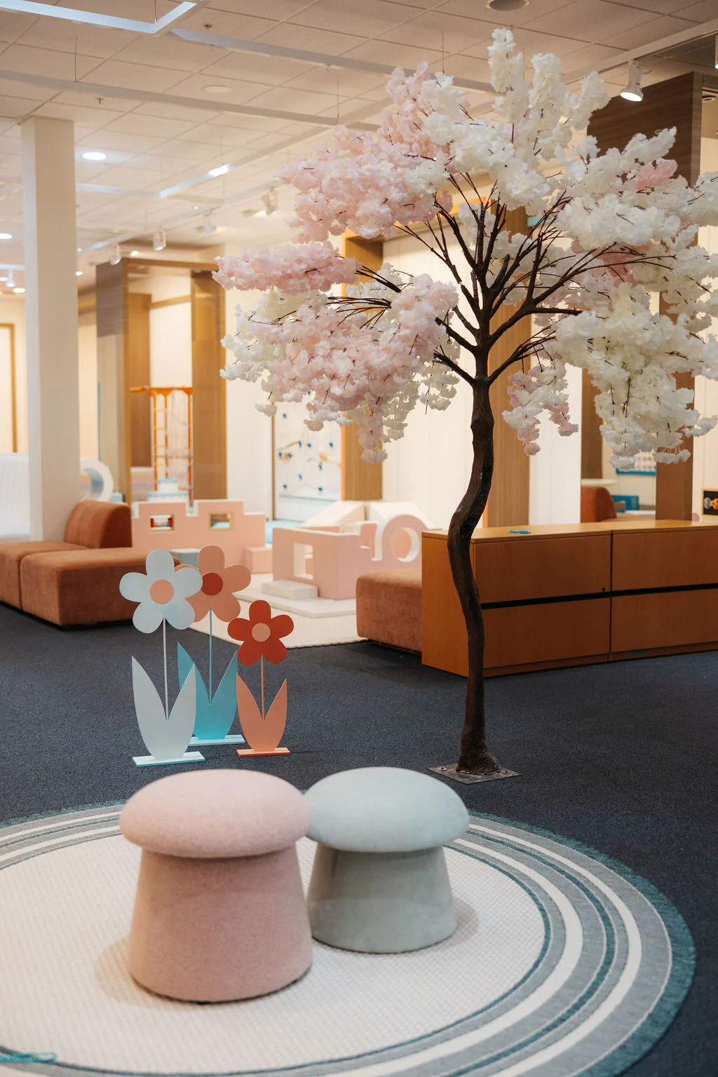 Bright Carnaby club lounge with blossom tree and seating